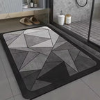 Tapis de bain Anguléa dans une douche moderne