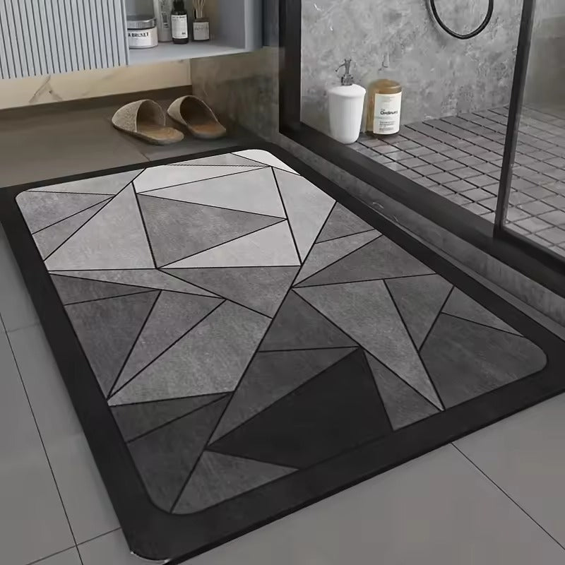 Tapis de bain Anguléa dans une douche moderne