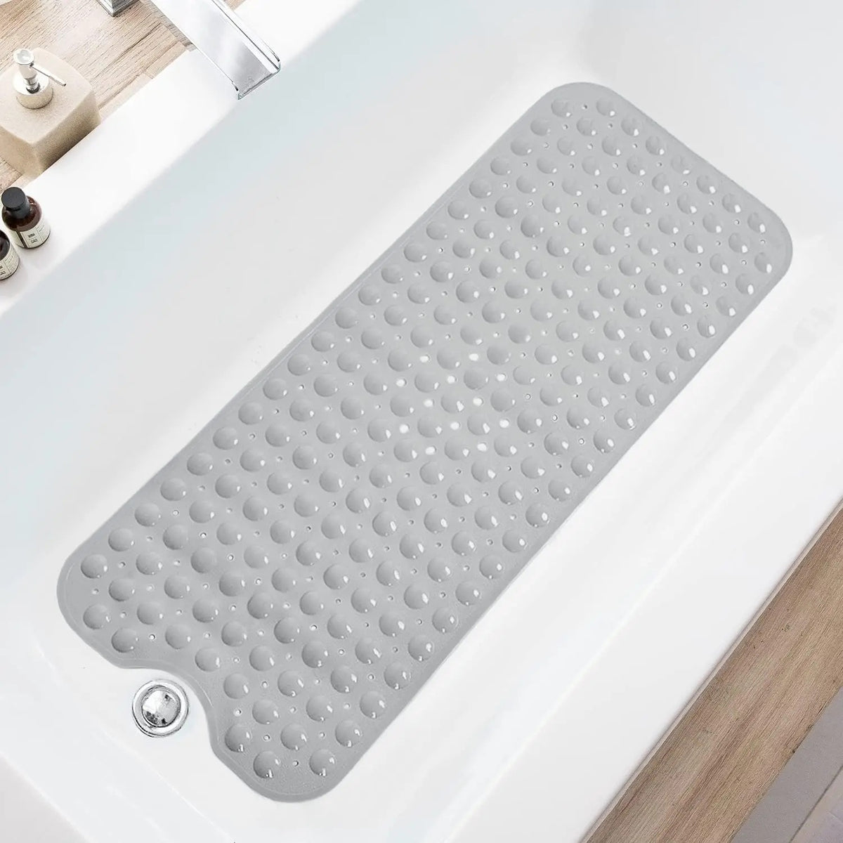 Baignéa coloris Gris Transparent dans la baignoire