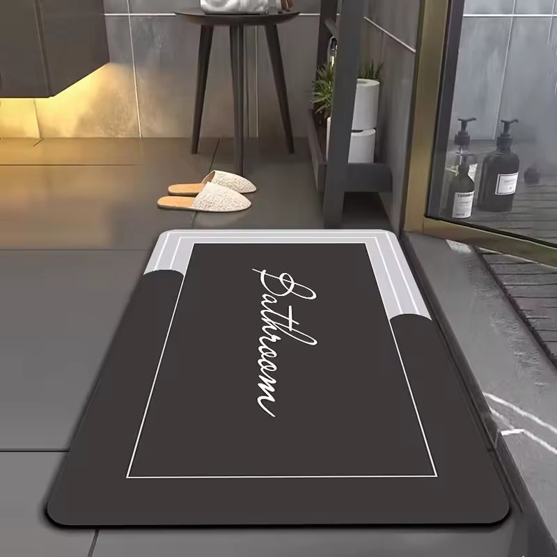 Tapis de bain Calligraphéa noir dans une douche moderne