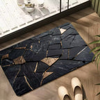 Tapis de bain Marbréa - effet marbre noir et doré